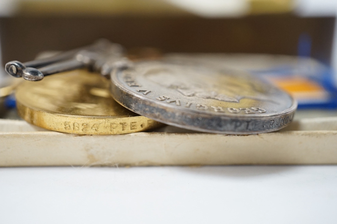 A posthumous First World War medal trio awarded to PTE. R. Holmes Oxf. & Bucks. L.I., together with the issuing letter, the remains of the original card box and a Princess Mary Christmas tin. Condition - fair.